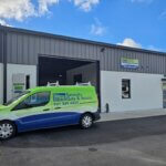 Sarasota Gate & Access service van parked outside the Bradenton facility and parts warehouse serving Southwest Florida