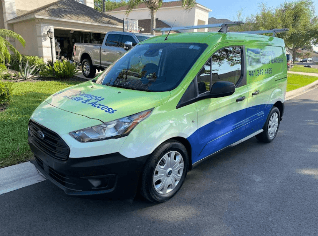 Sarasota Gate & Access branded service van parked in a Fort Myers residential community ready for security gate installation and service