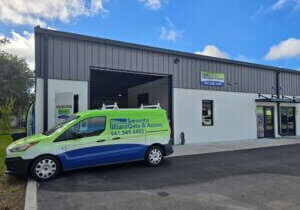 Sarasota Gate & Access service van parked outside the Bradenton facility and parts warehouse serving Southwest Florida