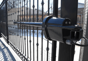 Apollo swing gate opener operator mounted on an ornamental iron gate, the type of Apollo gate system installed and serviced by Sarasota Gate & Access in Sarasota County